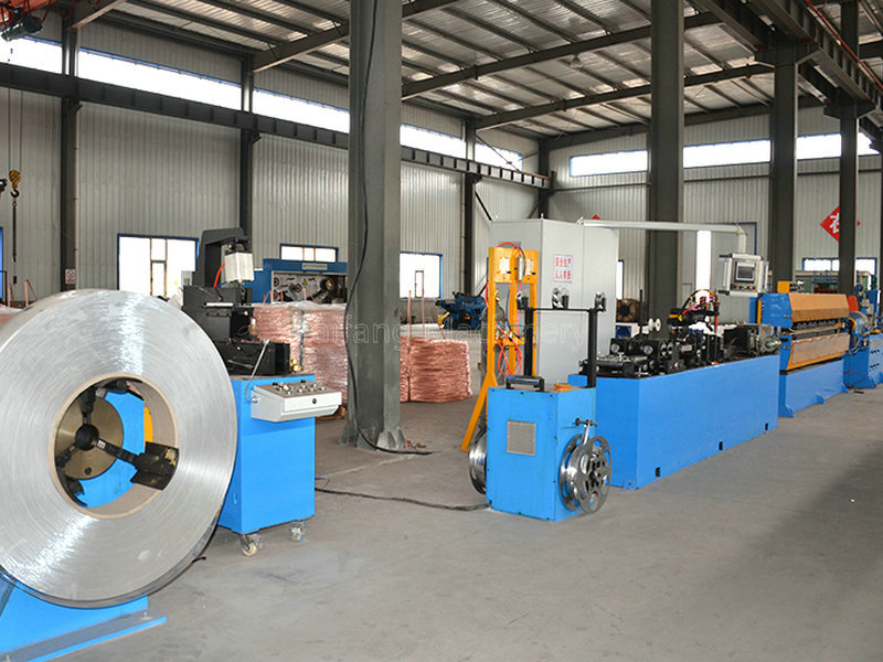 Metal sheath welding and embossing machine